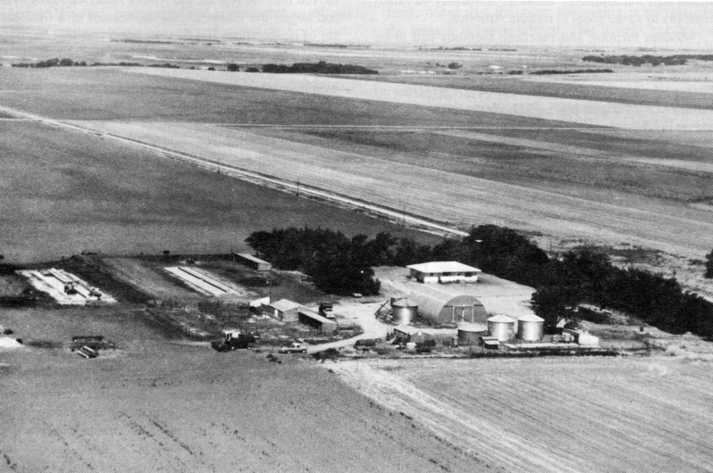 This is a 1985 aerial photograph of the farm of Robert Parke and Barbara Nemechek-Parke, parents of Steve Parke: Barbara's parents were Bukovinian immigrants: This farm is 20 miles southwest of WaKeeney Kansas, in southwest Trego County: The view is in a northwesterly direction and about 9 miles from Castle Rock, a landmark for early travelers and settlers in the area: